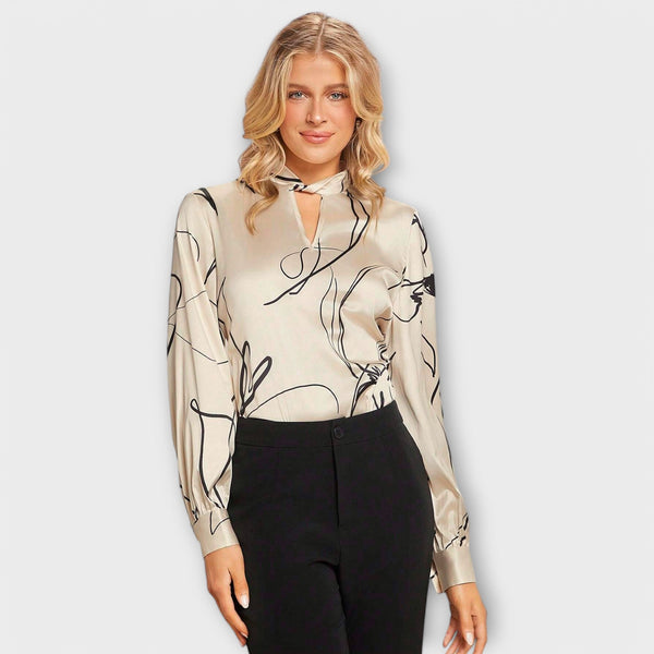 Elegant blouse with linear pattern