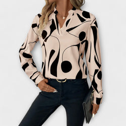 Elegant blouse with long sleeves and pointed neckline