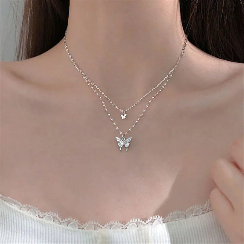 Refined silver necklace with glittering butterfly