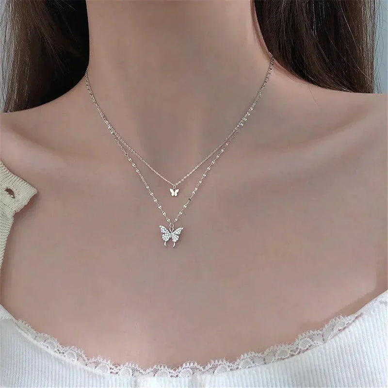 Silver necklace with glittering butterfly