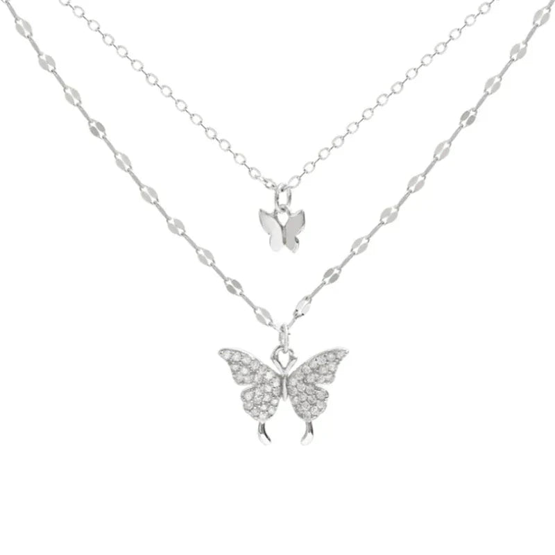 Silver necklace with glittering butterfly