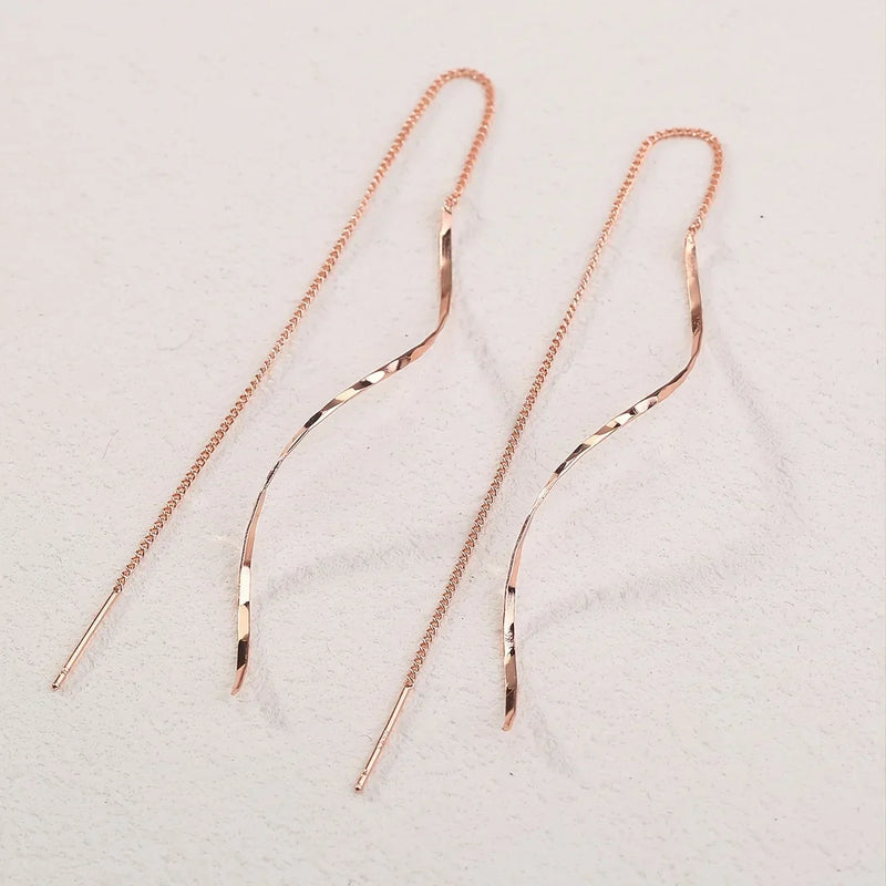 Long earrings with a wavy pattern