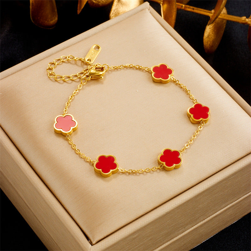 Elle - Luxury bracelet and floral earrings